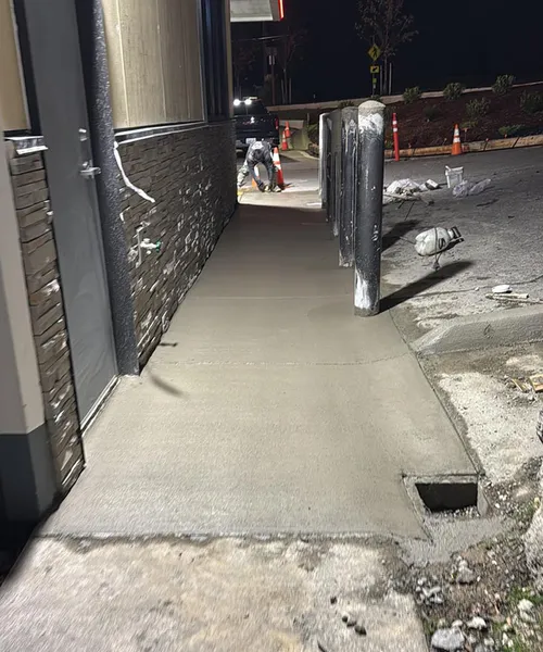 Sidewalk and curb gutter repair in Shell Gas Station in Newcastle 